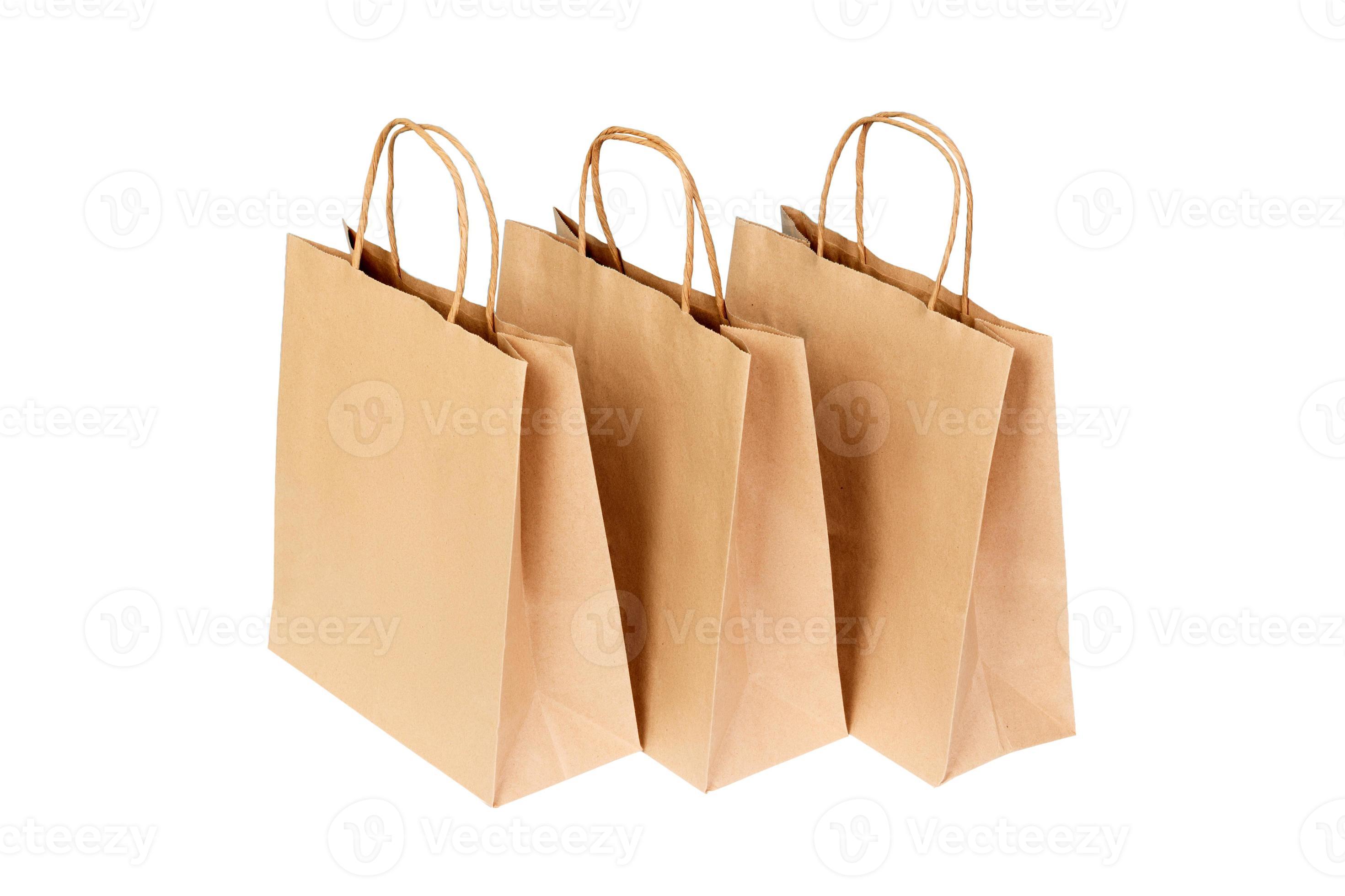 Brown recycled paper shopping bag isolated on white background 14567082 Stock Photo at Vecteezy