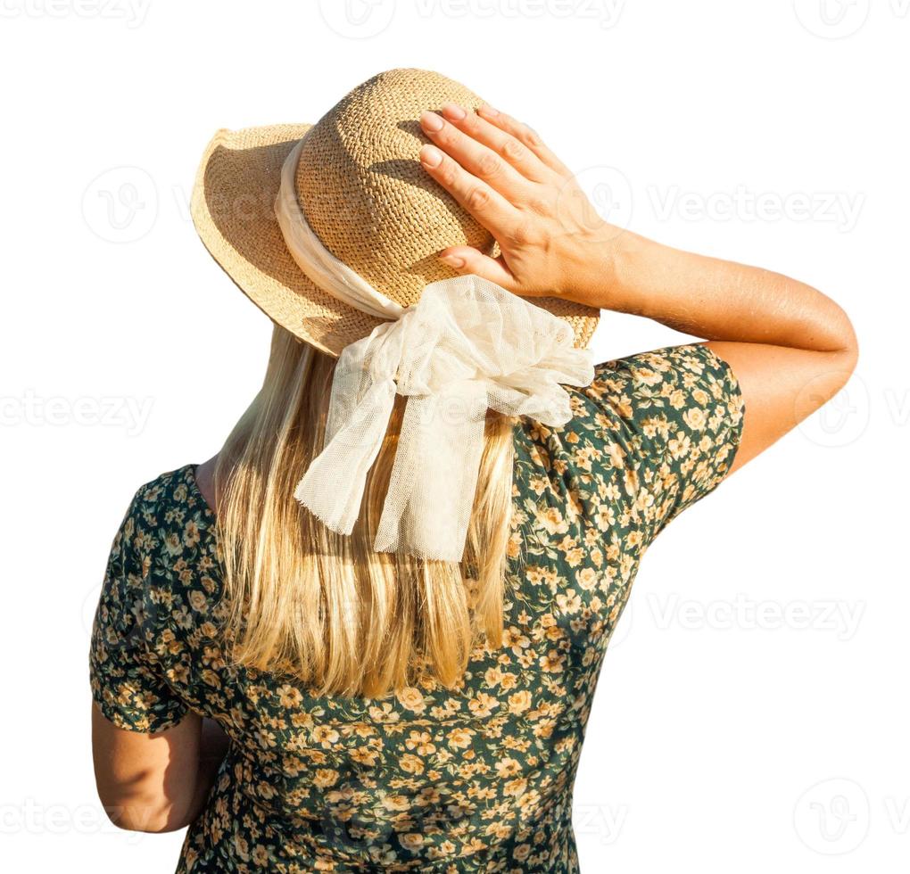 Pretty Caucasian Outdoors Girl Wearing Sundress and Hat Facing Away From Camera on White Background. photo
