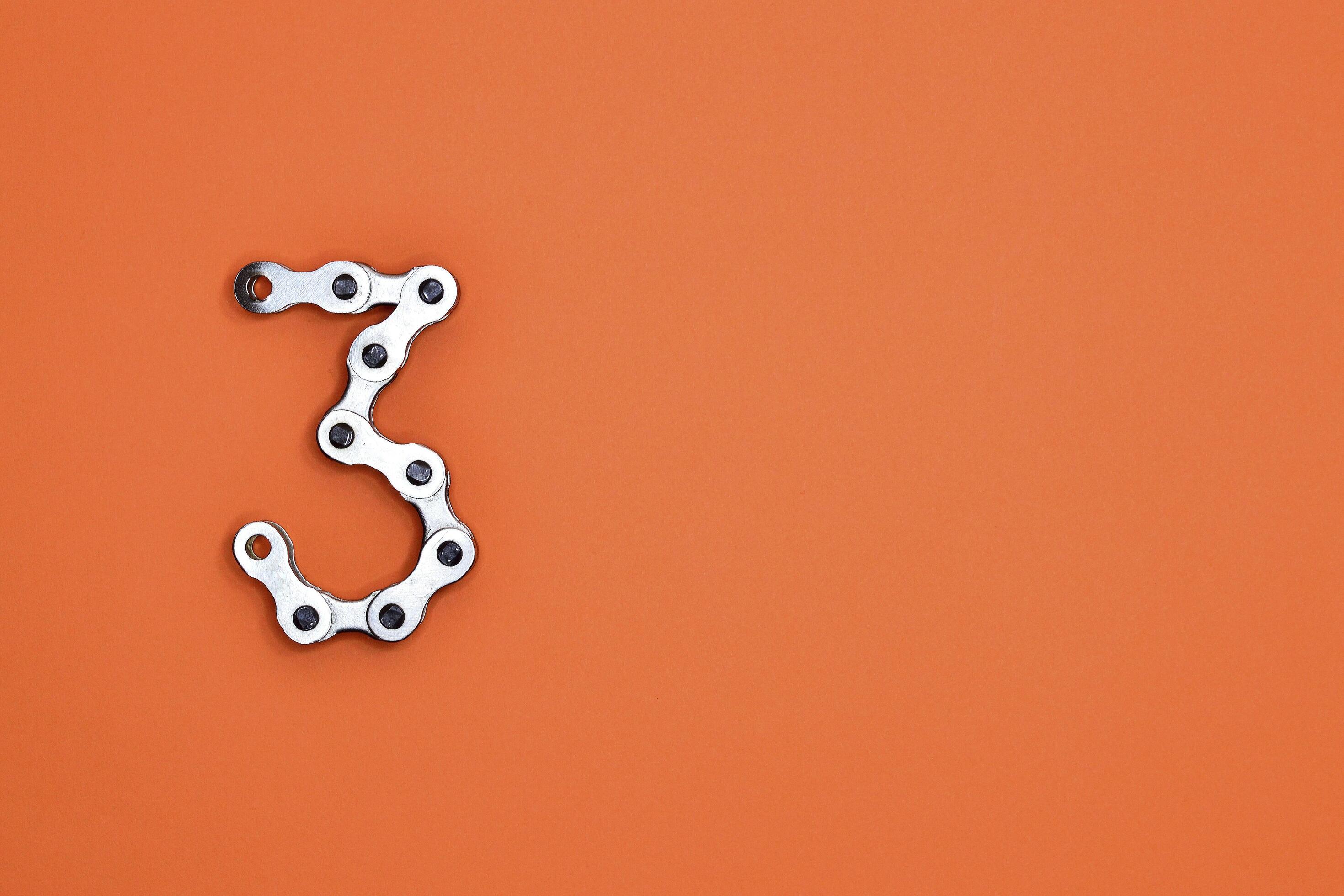 bike chain number three 14575350 Stock Photo at Vecteezy