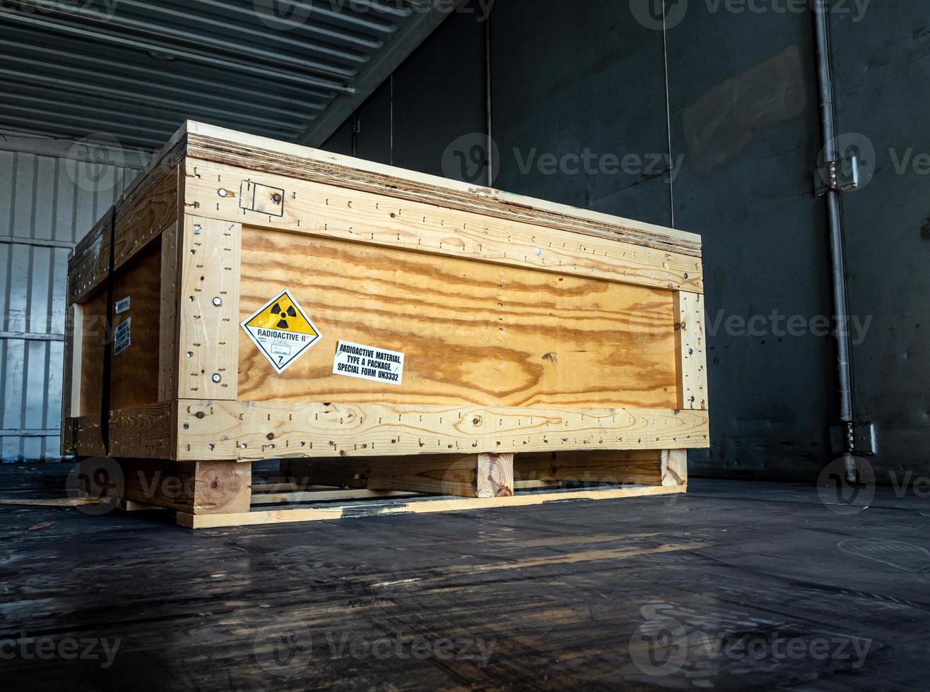 Radiation warning sign transport label Class 7 on the Dangerous goods package type A in the container of transport truck photo