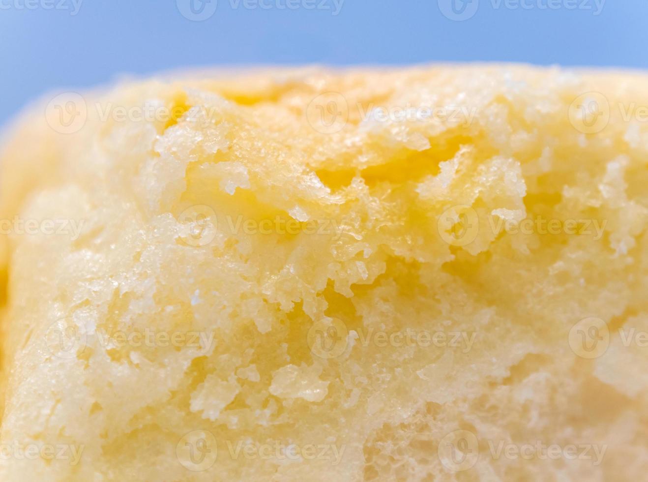 textura de primer plano de azúcar finamente recubierta en pan suave foto