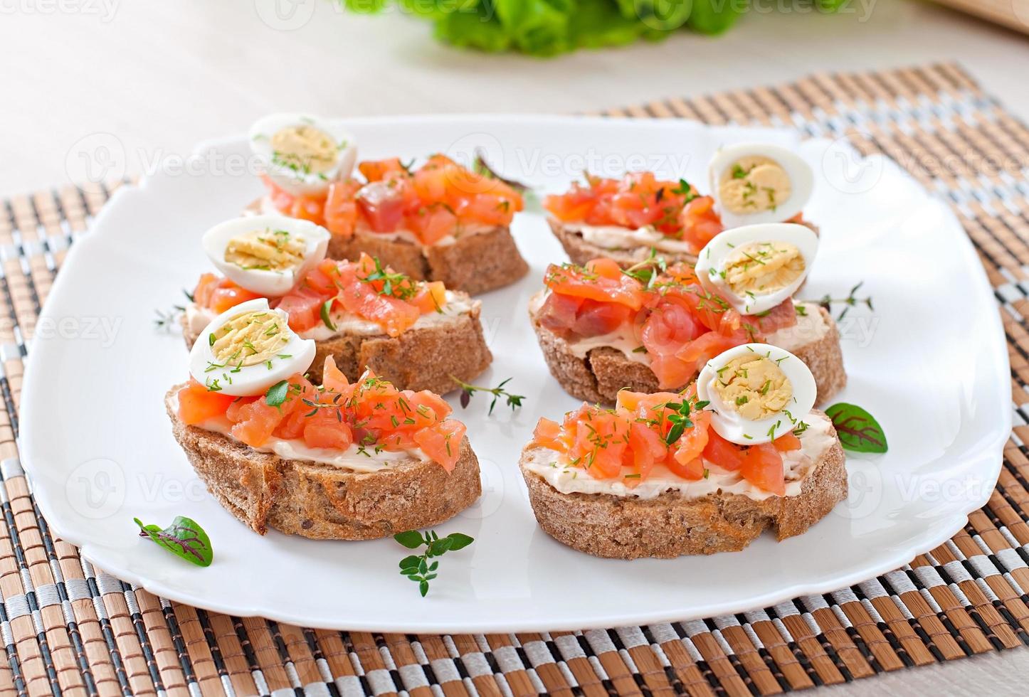 Sandwich with salted salmon and cream cheese. photo