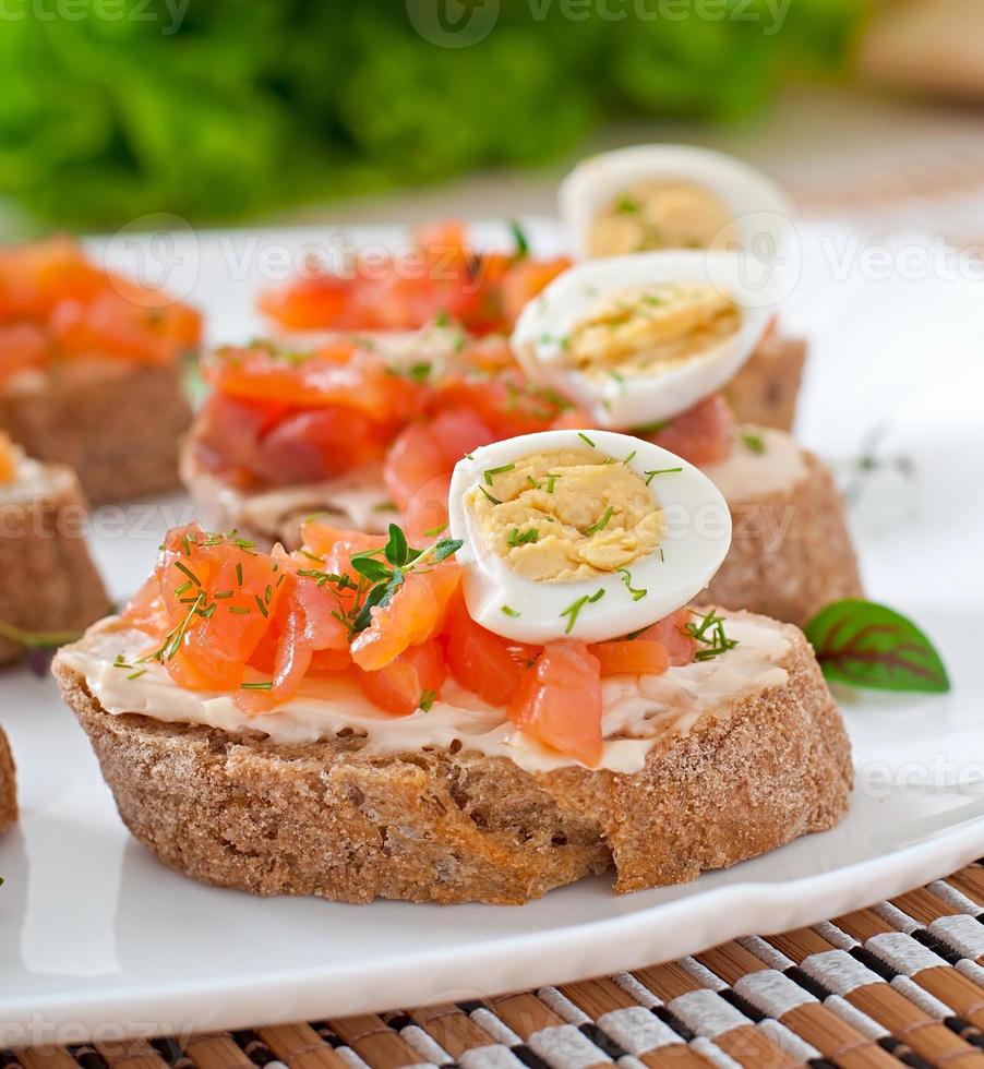 Sandwich with salted salmon and cream cheese. photo
