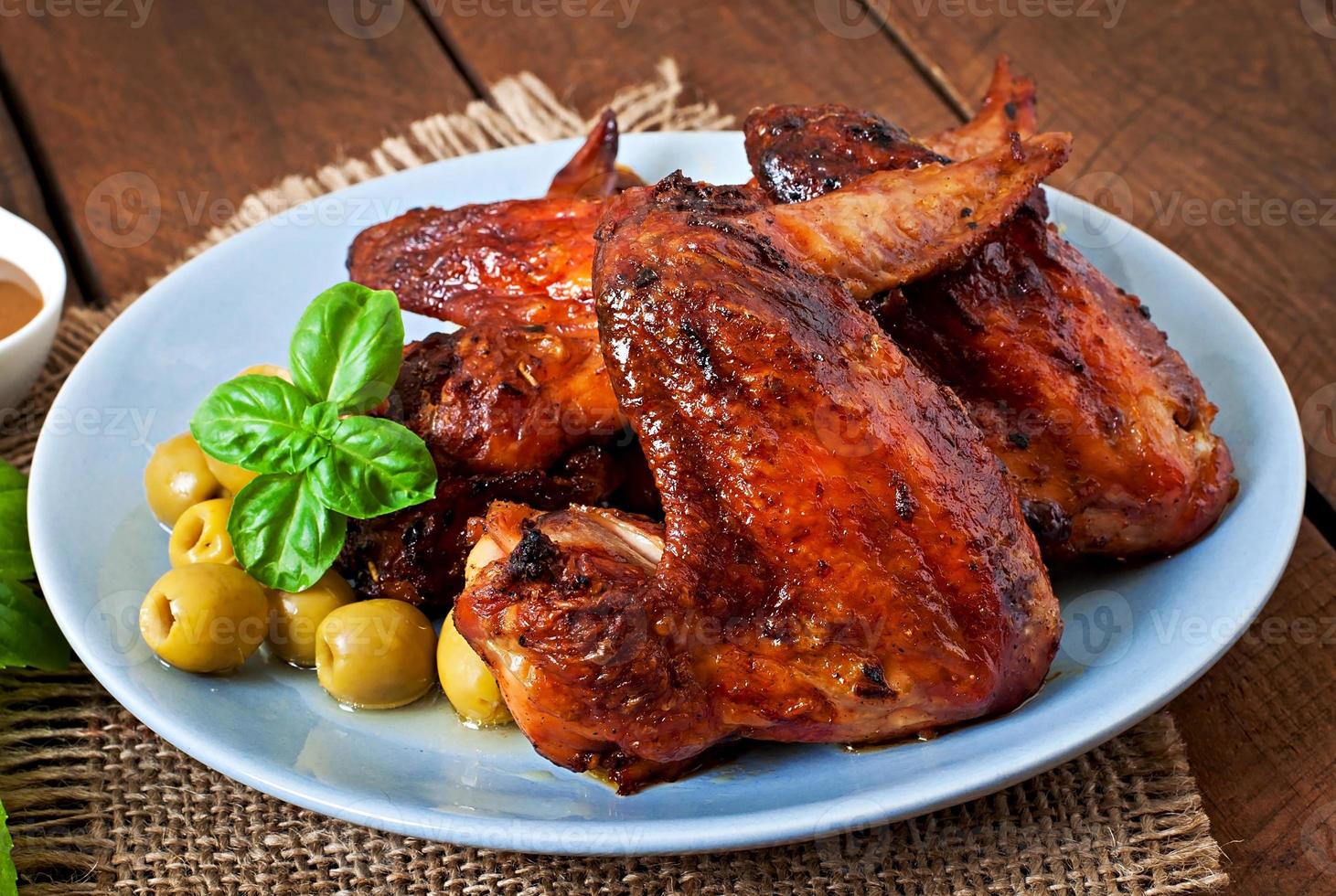 Plate of chicken wings on wooden background 14582480 Stock Photo at
