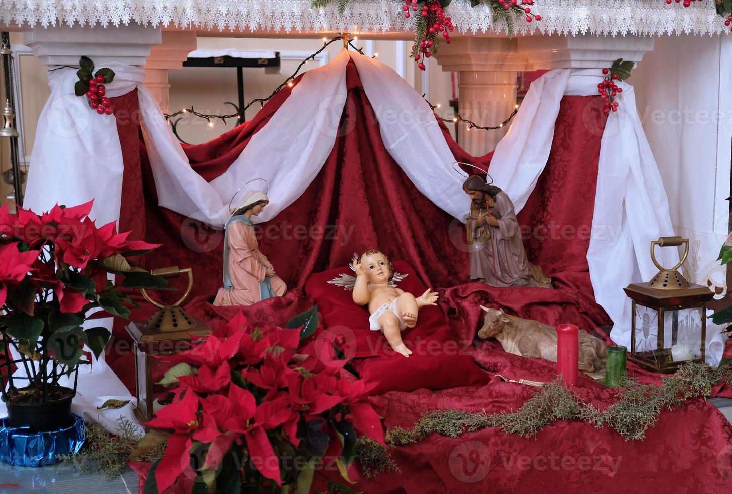 Nativity scene with baby Jesus. Elements of the Catholic Christian crib. Decor in the church. photo