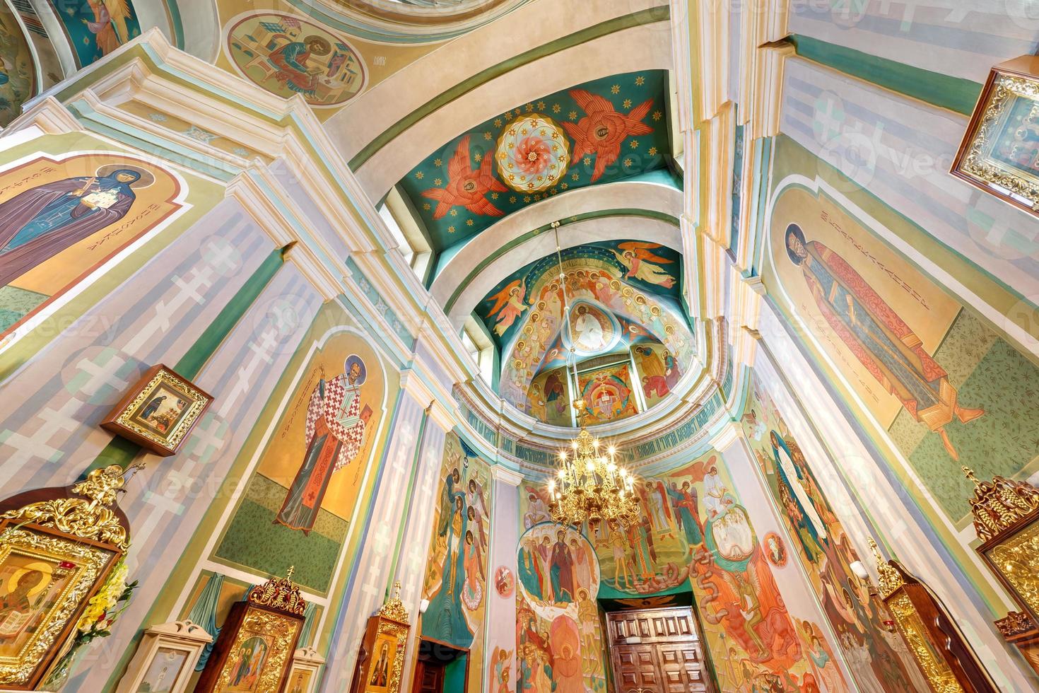 dome and altar of orthodox church with arches and columns, ceiling and vaulting with fresco photo