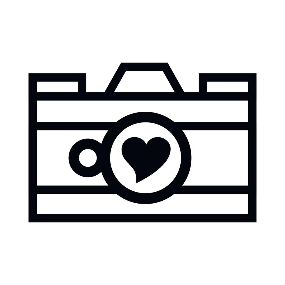 Photo camera with heart in the lens icon vector