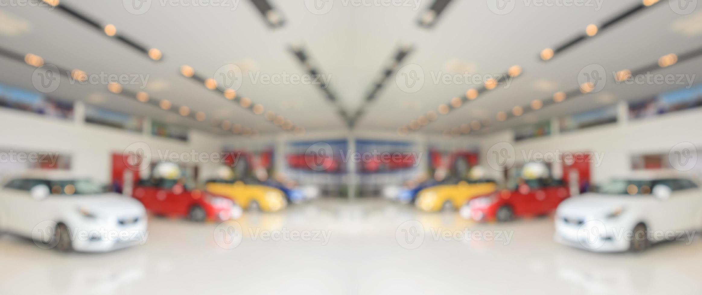 new cars in showroom interior blurred abstract background photo