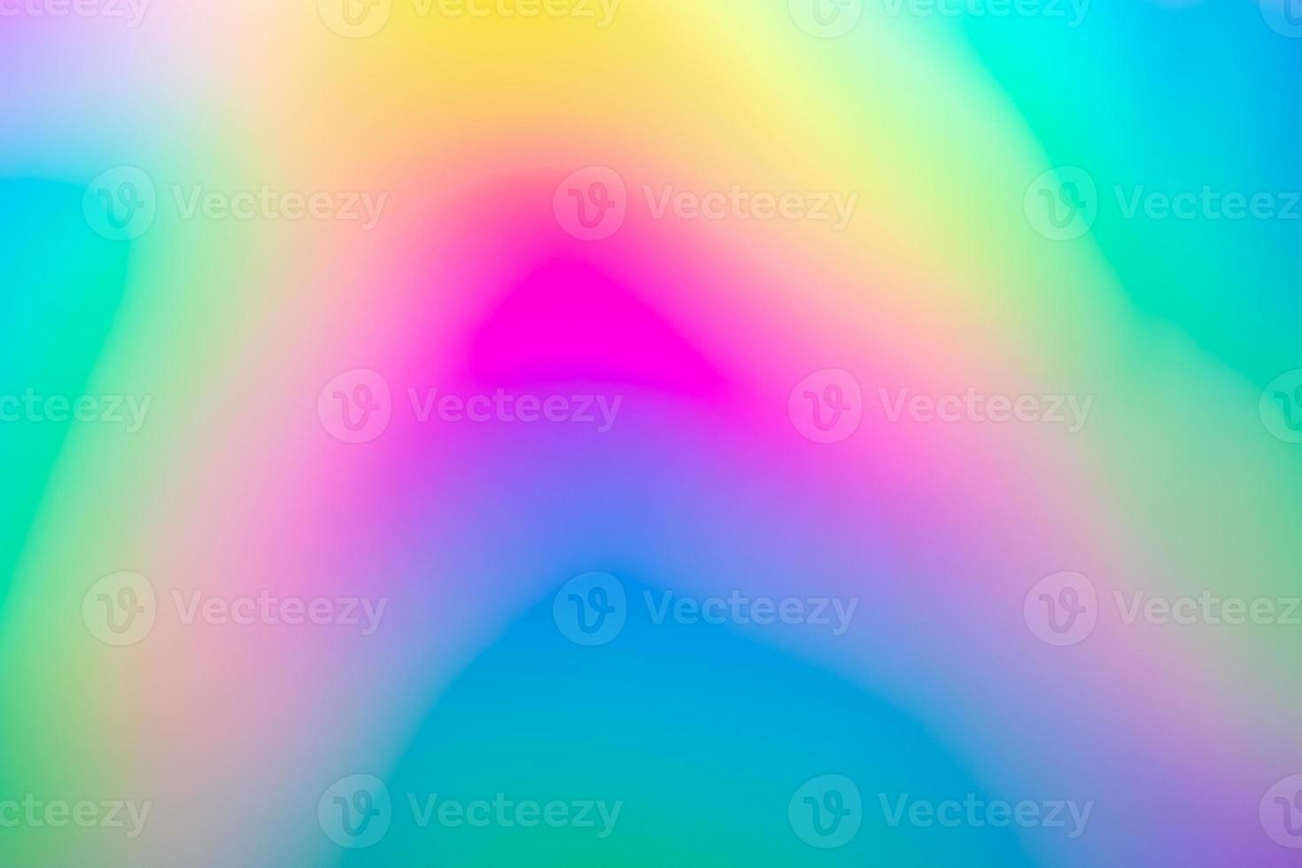 Abstract blur holographic rainbow foil iridescent background photo