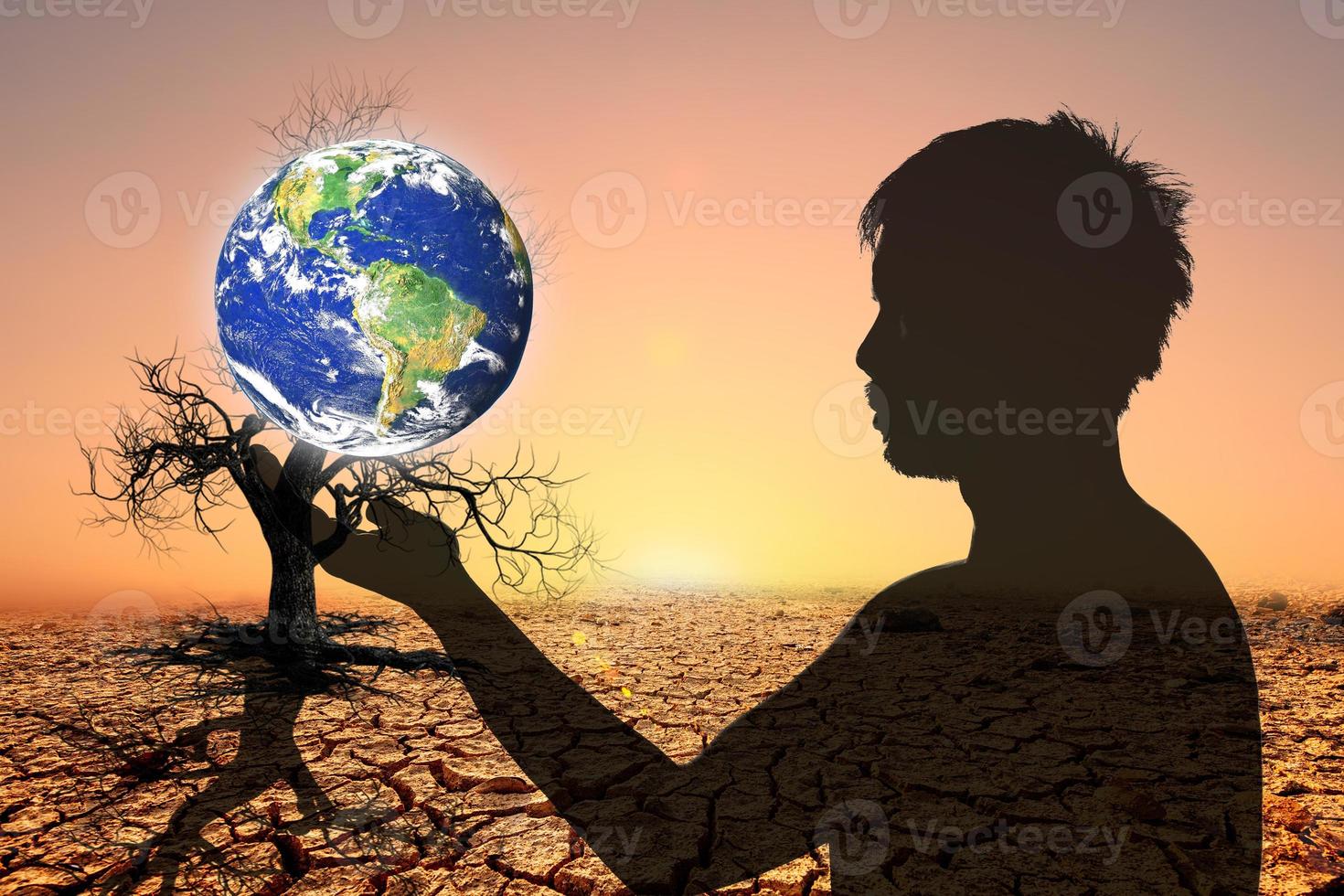 Love the earth and protect the environment concept. Earth day. Earth in people's hands. photo