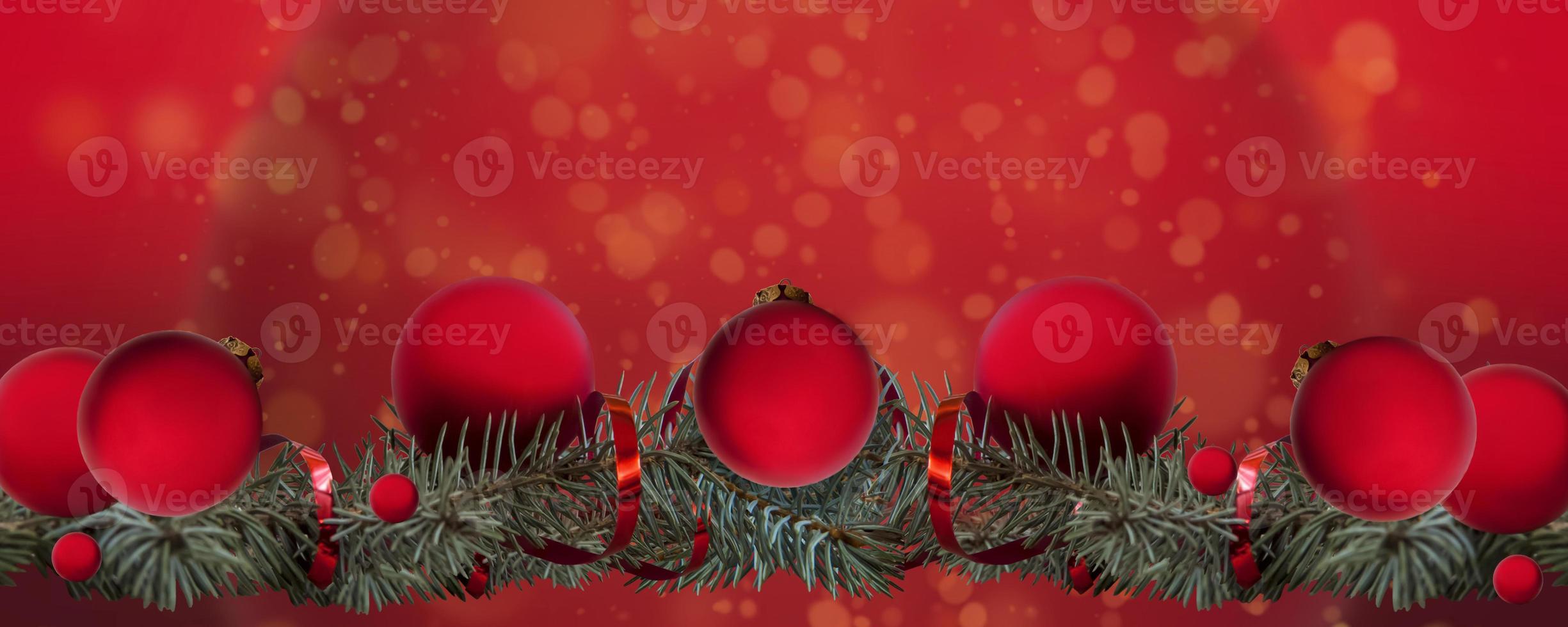 Red Christmas banner. Fir branches and red balls on a red background. Christmas, holiday, greetings. Background for advertising and business. photo