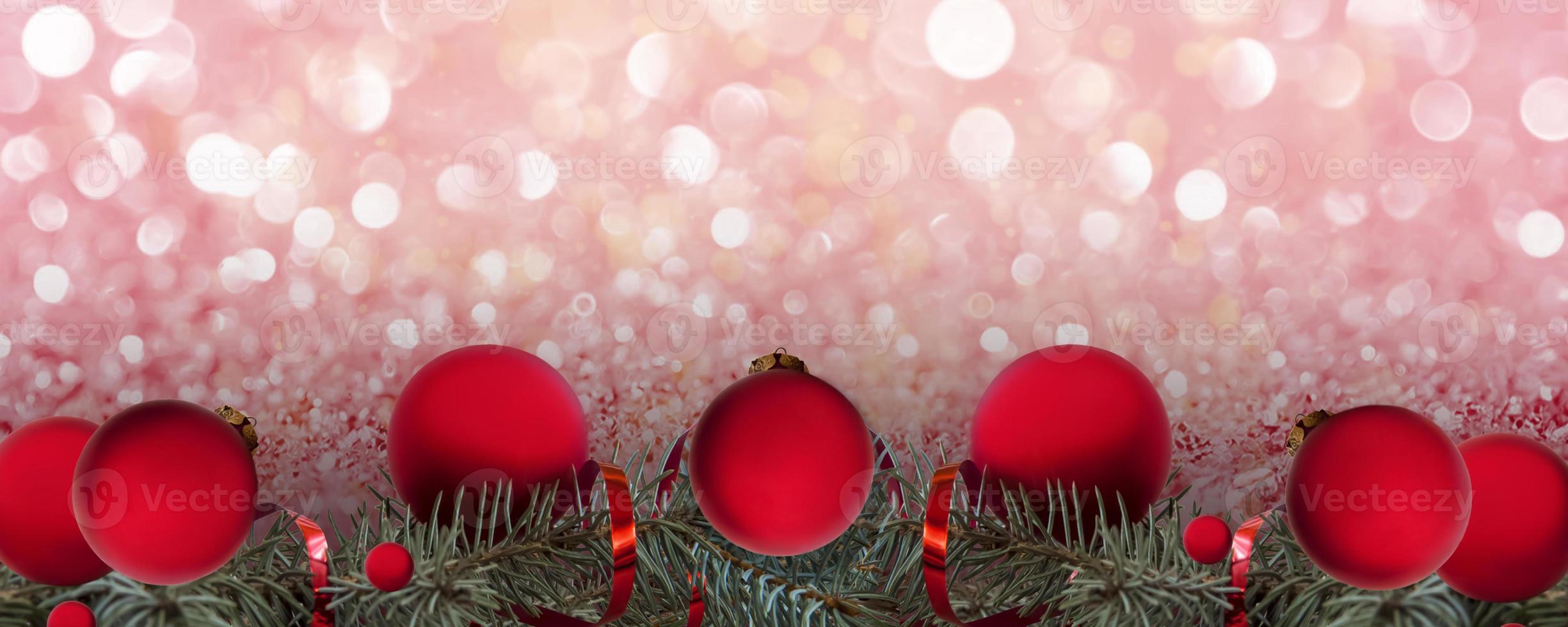 Christmas banner. Spruce branches and red balls on a shiny background. Christmas, holiday, greetings. Background for advertising and business. photo