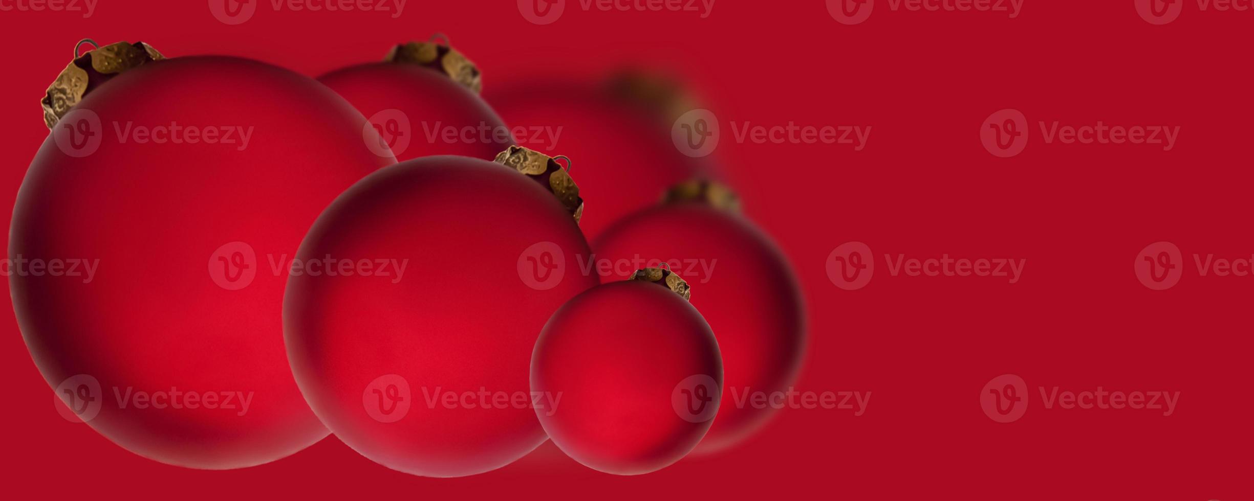 Christmas banner. Red balls on a red background. Christmas, holiday, greetings. Background for advertising and business. photo