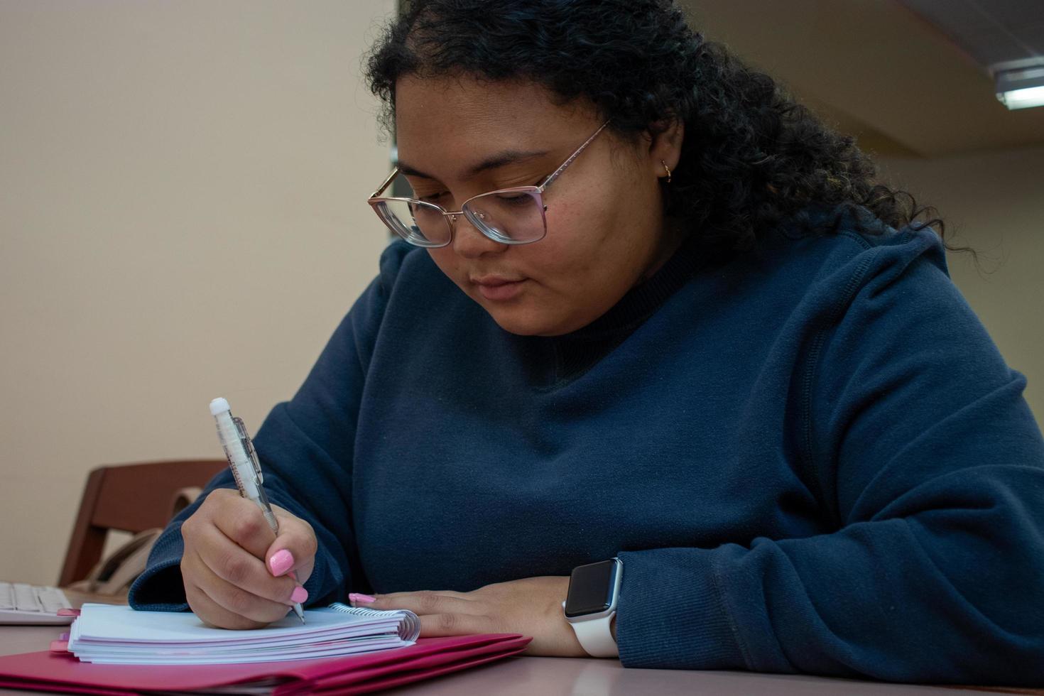 Student Studying in the Library photo