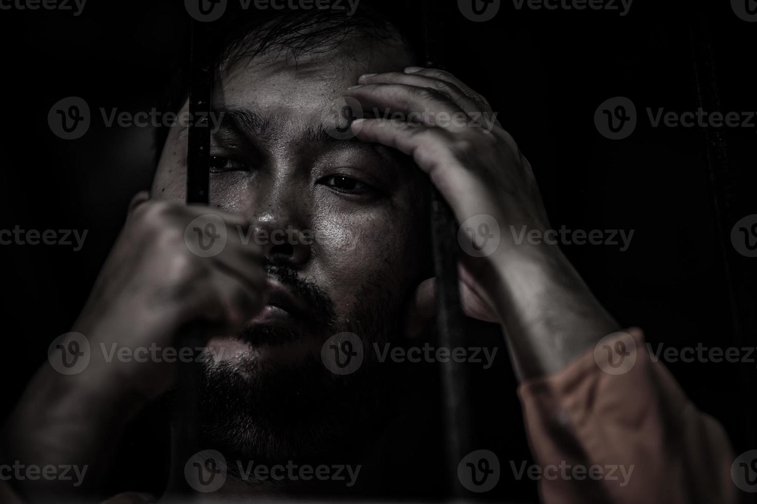 Hands of men desperate to catch the iron prison,prisoner concept,thailand people,Hope to be free. photo