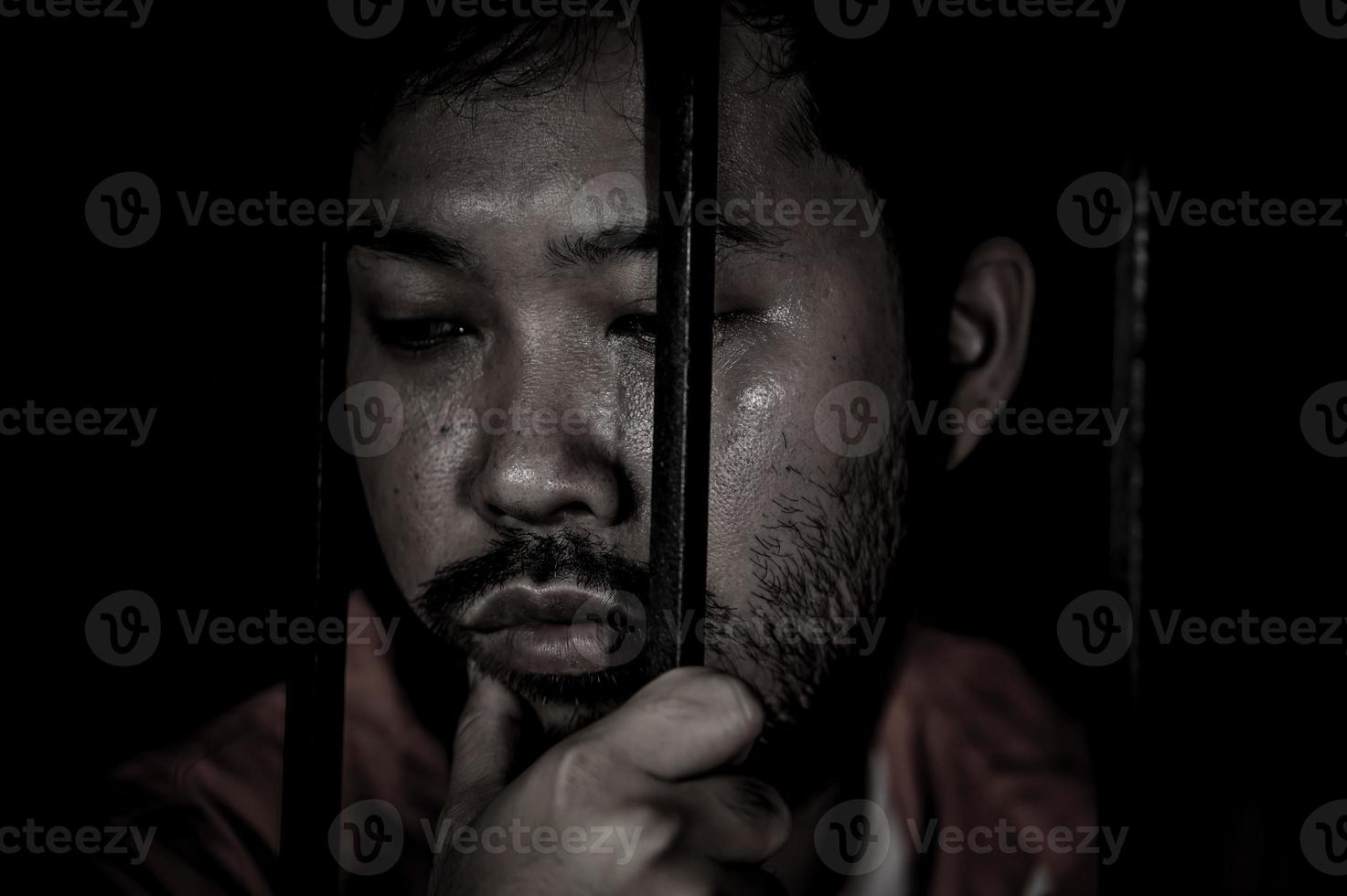 Hands of men desperate to catch the iron prison,prisoner concept,thailand people,Hope to be free. photo