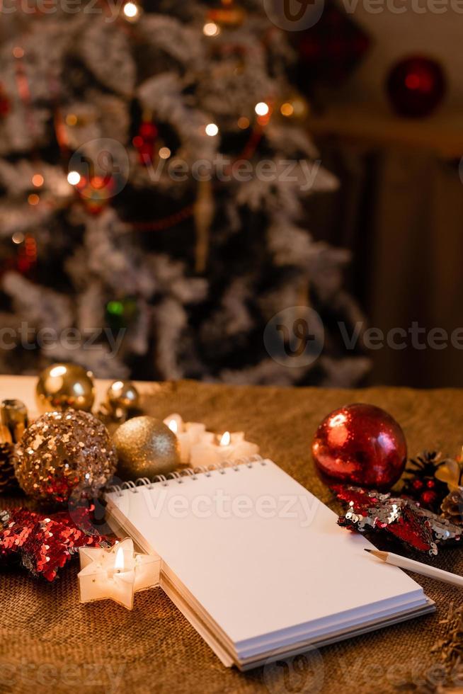 notebook with blank pages with New Year's toys, gifts and numbers 2023. Plans and dreams for the New Year, space for text photo