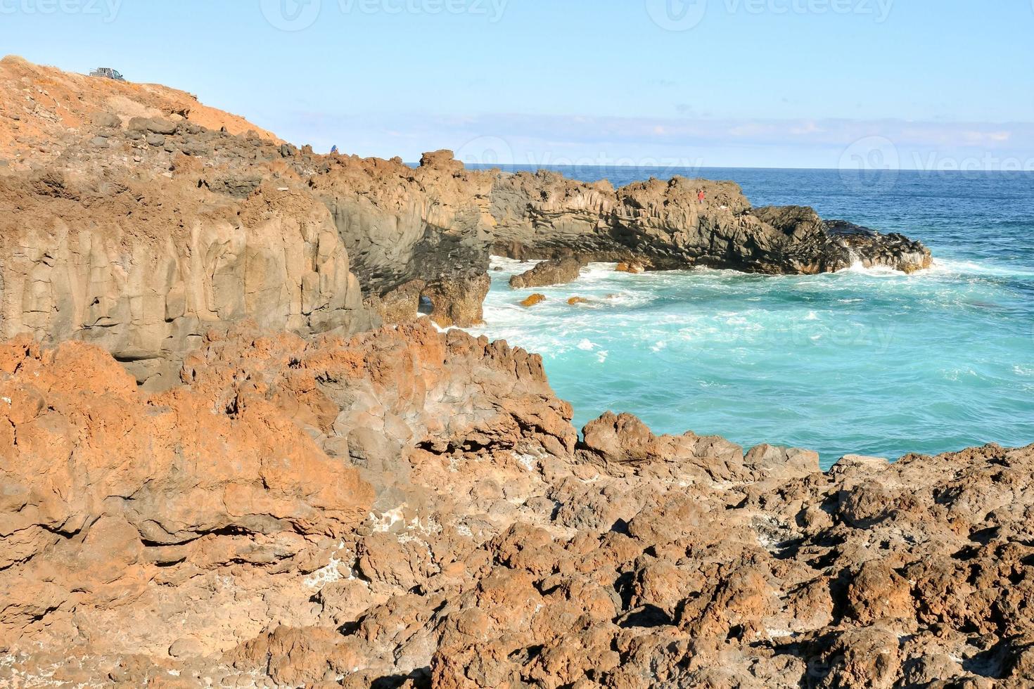 Waves hitting a rock scene 14592807 Stock Photo at Vecteezy