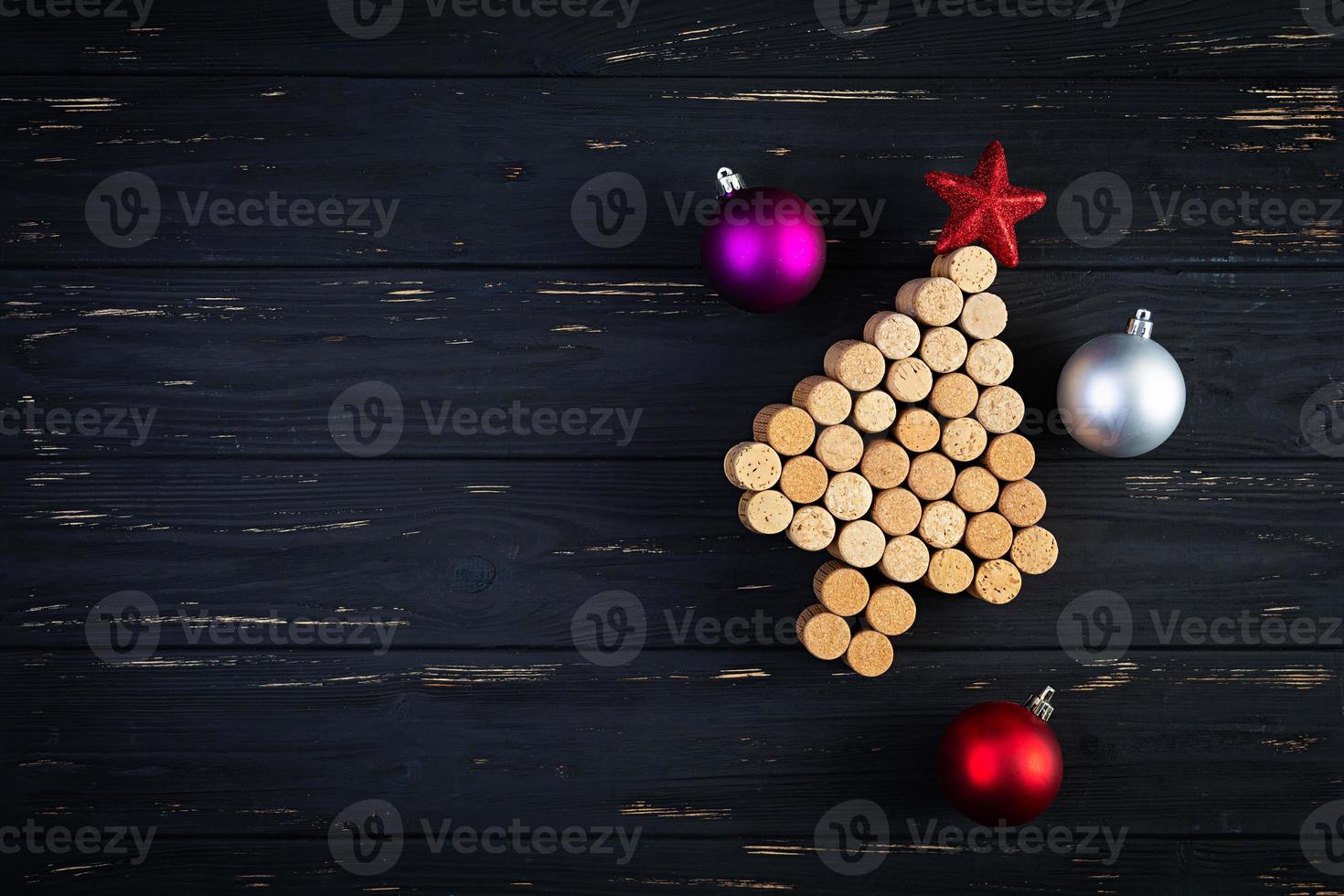 Wine cork tree with Christmas decorations. New Year's gift card mockup photo