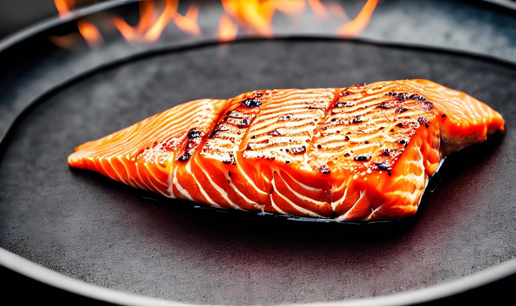 Grilled salmon. Healthy food baked salmon. Hot fish dish. photo