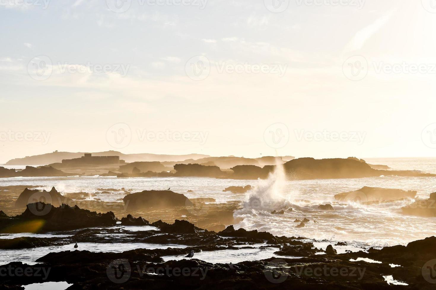 Sunset over the ocean in Morocco photo