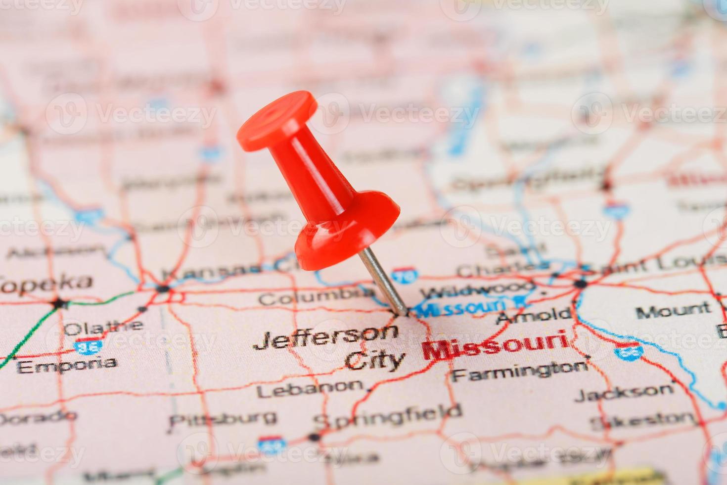 Red clerical needle on a map of USA, Missouri and the capital Jefferson City. Close up map of Missouri with red tack photo