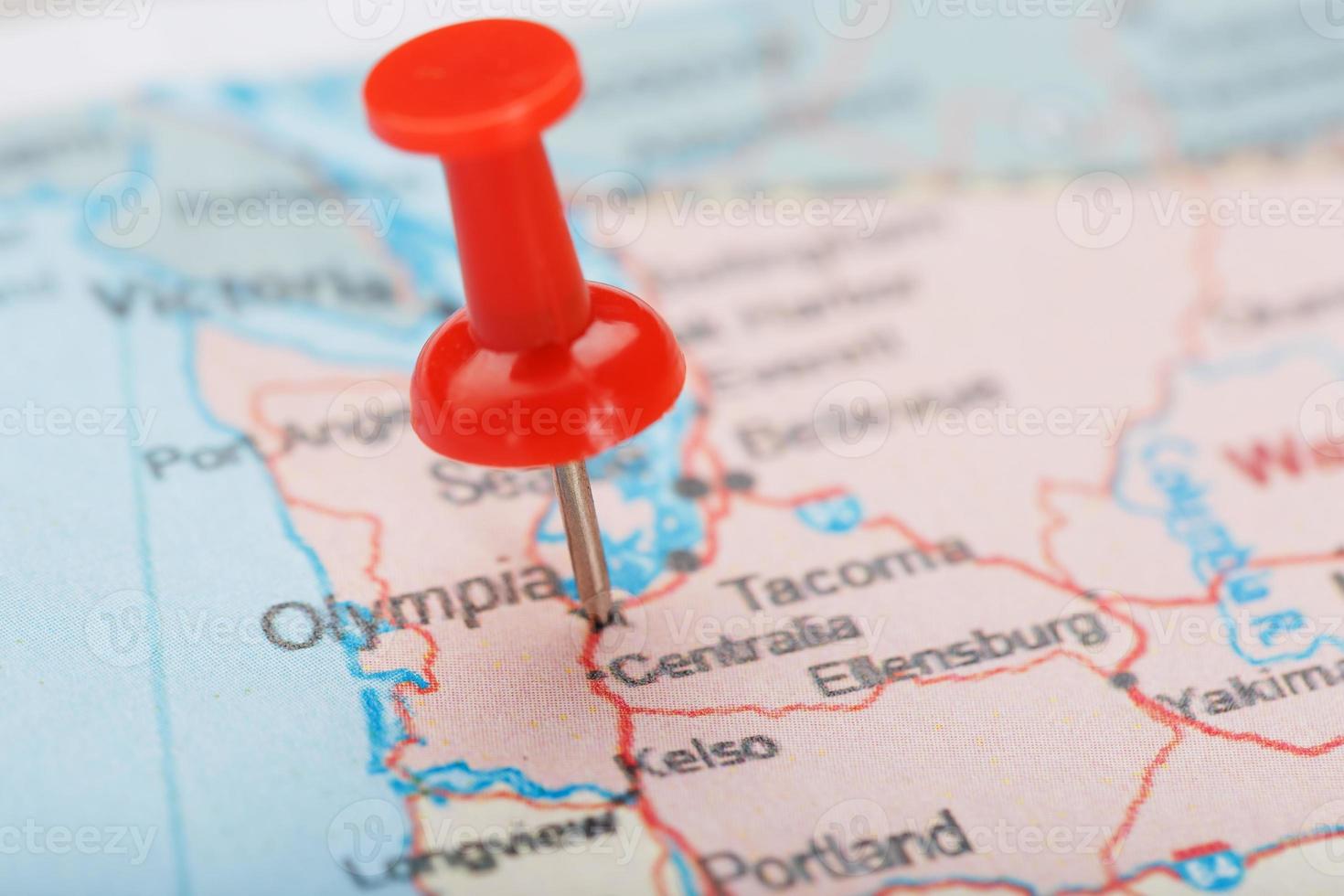 Red clerical needle on map of USA, Washington and DC. Close up map of Washington with red tack photo