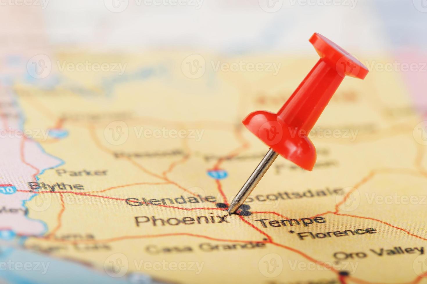 Red clerical needle on a map of the USA, Arizona and the capital Phoenix. Close up map of orizona with red tack photo