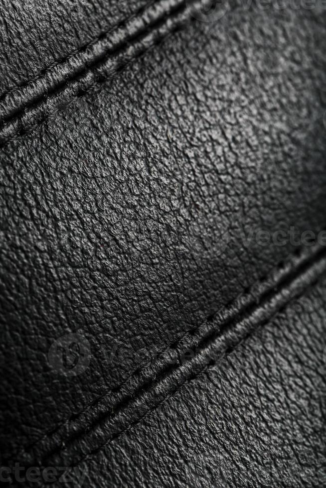 la textura de las sillas de cuero negro. las costuras se cierran. foto