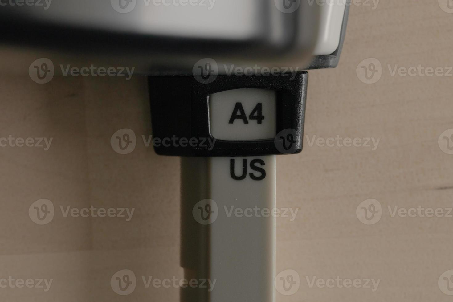 A4 paper size. Paper perforator size photo