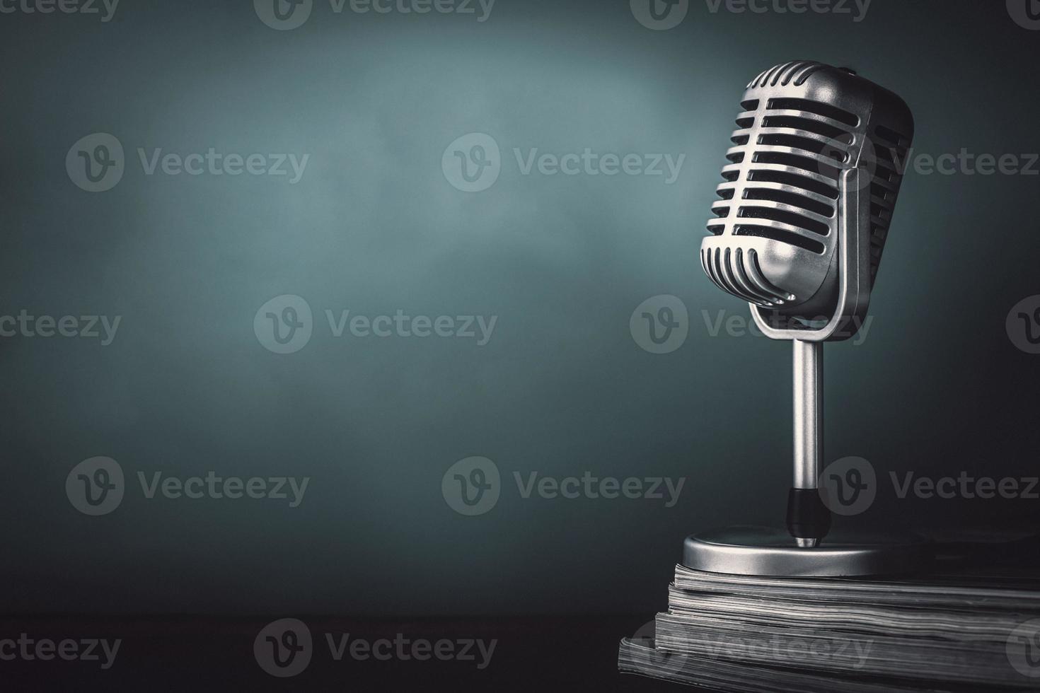 Microphone with magazine on wooden table vintage stlye photo