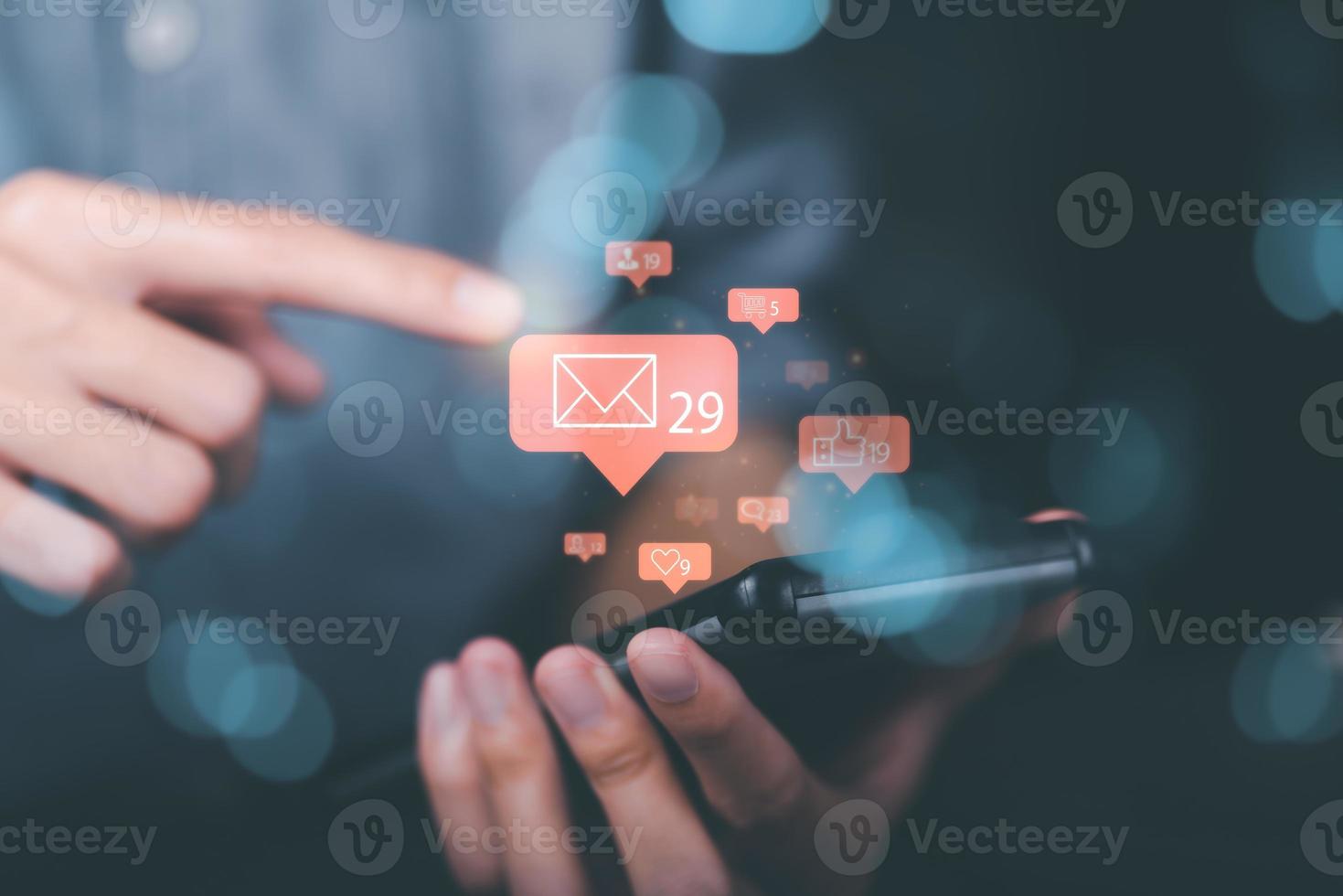 young man holding a smartphone Displays global communication network connections, cyberspace technology, online information exchange, internet of things, Notifications from applications photo
