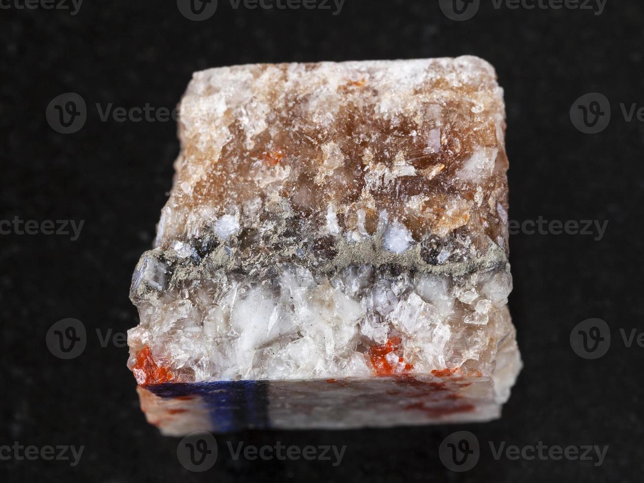 rough rock salt on dark background photo