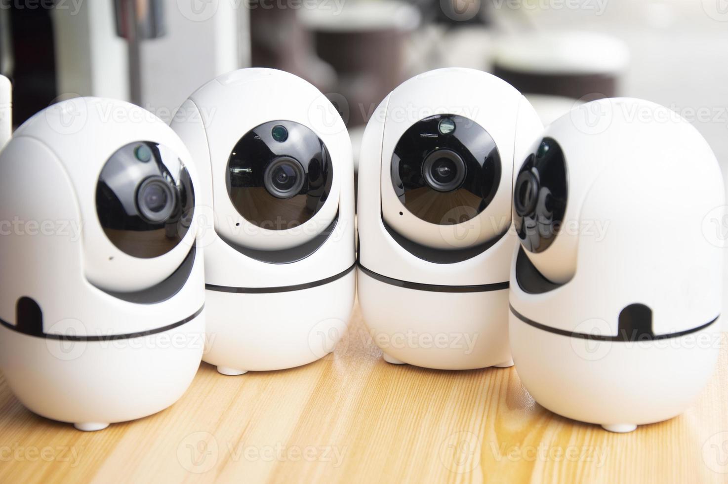 White IP cameras, very popular for security purposes. photo