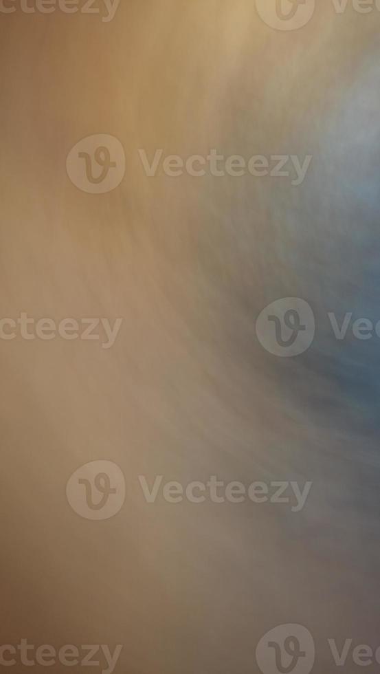 Art blur and speed of light Orange, yellow, gray and black, light and color like fog and smoke. photo