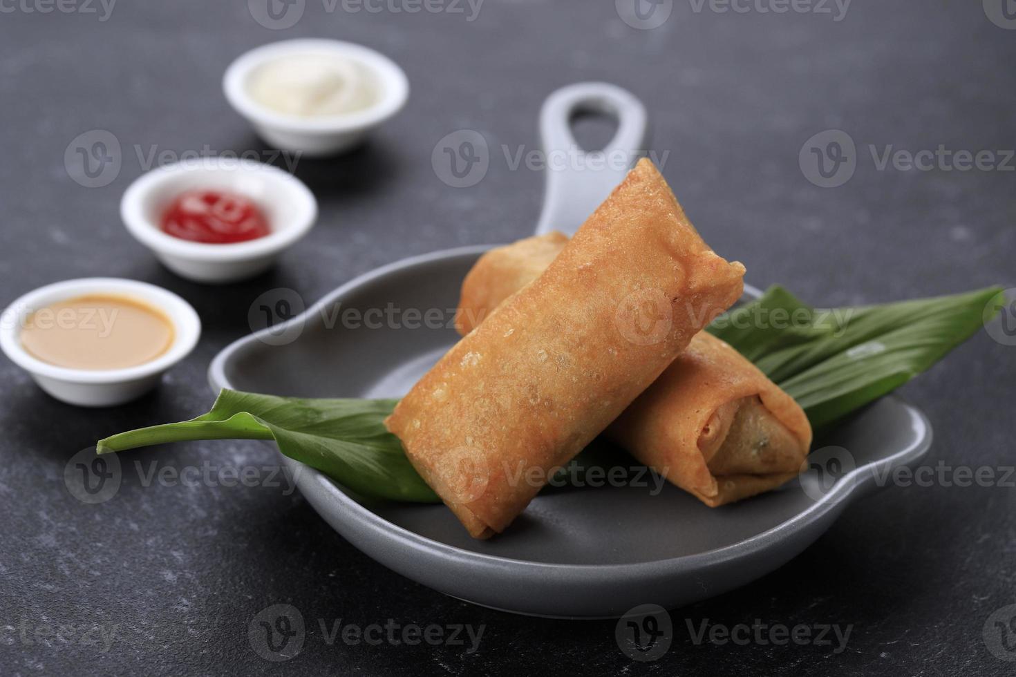 Fried Spring Roll with Peanut Sauce, Chilli Sauce, and Mayonaise photo