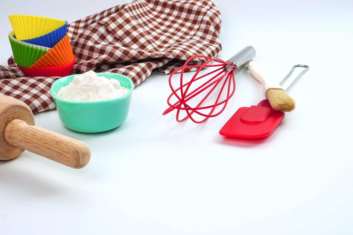 Set of kitchen utensils and ingredients for bakery on white background. photo