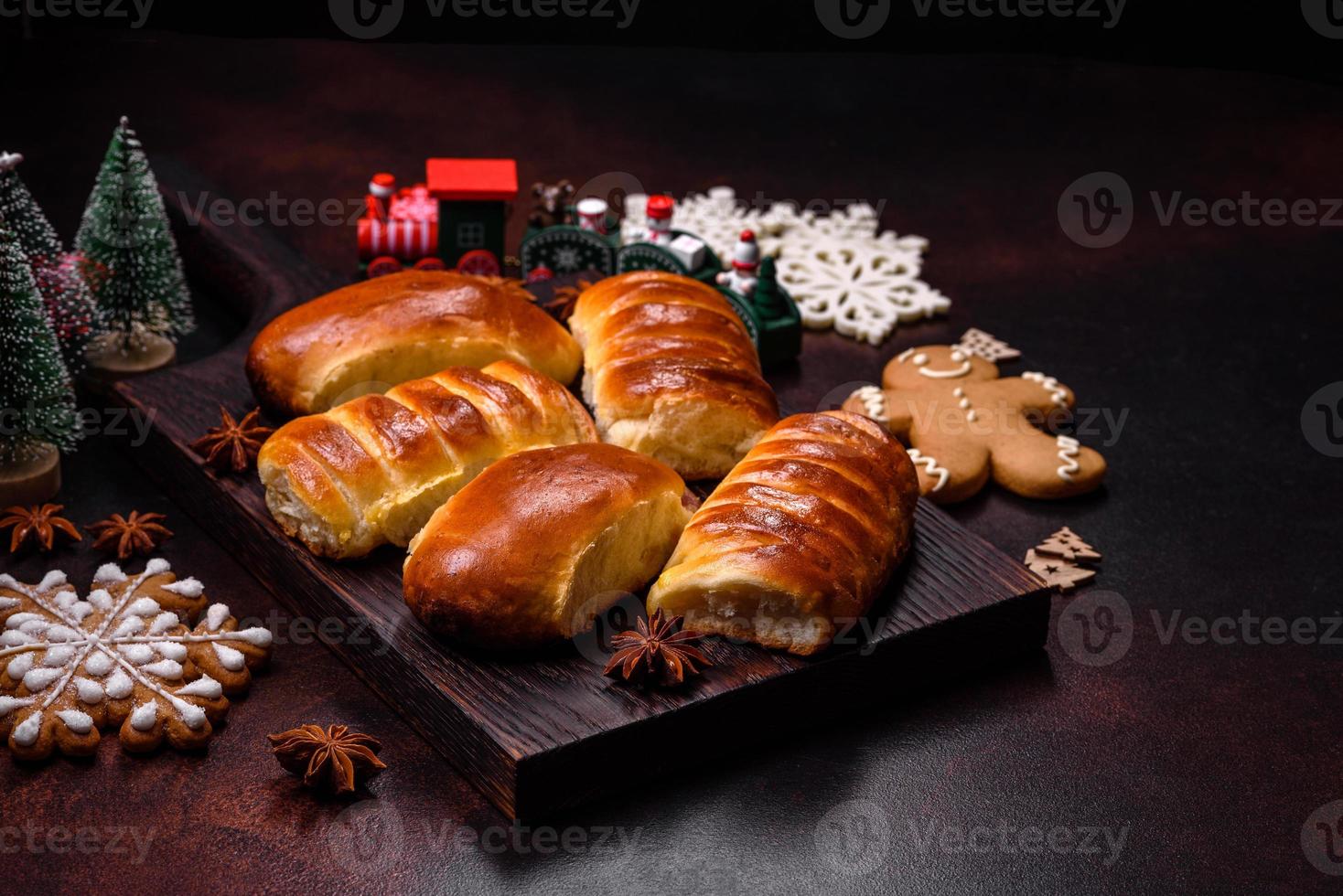 Sweet tasty fresh festive baking on a dark concrete background photo