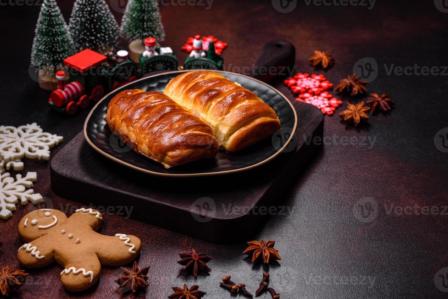 Sweet tasty fresh festive baking on a dark concrete background photo