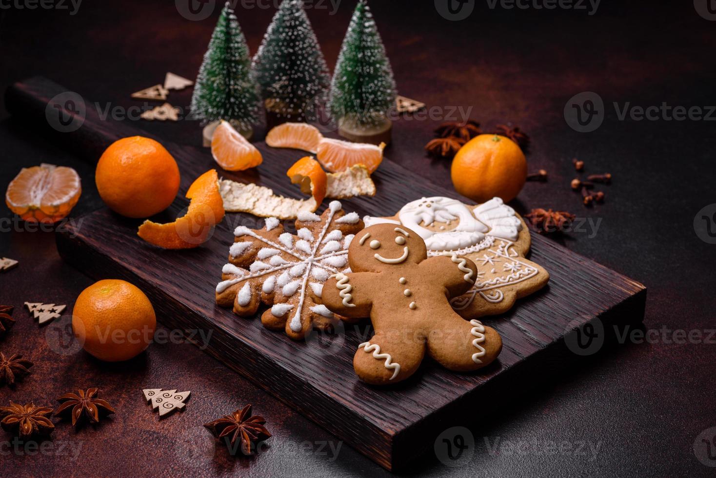 Beautiful Christmas decorations with holiday toys, clementines and gingerbread photo