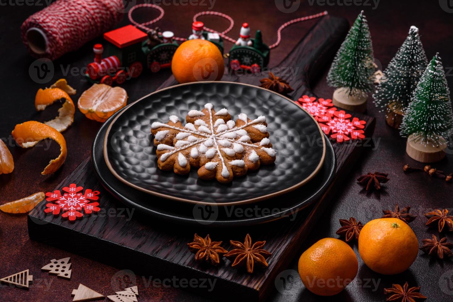 Beautiful Christmas decorations with holiday toys, clementines and gingerbread photo