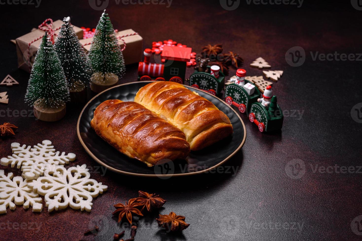 Sweet tasty fresh festive baking on a dark concrete background photo