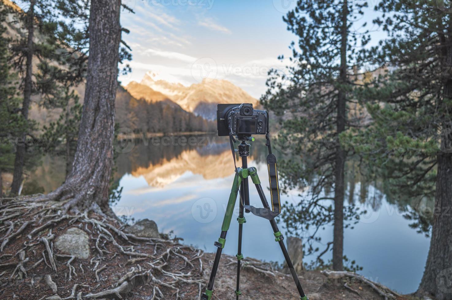 A tripod camera for shooting mountain landscape photo