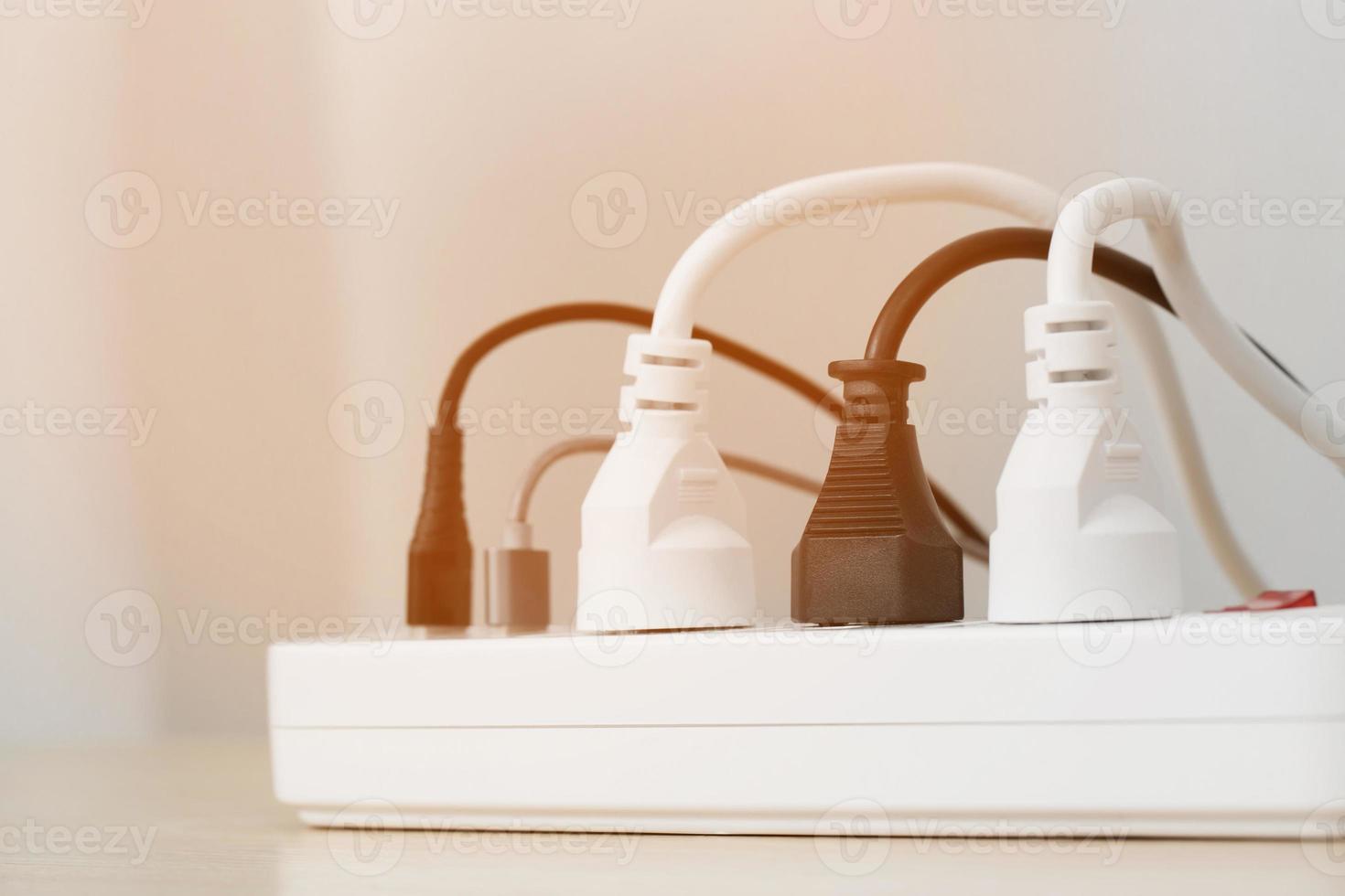 Electrical appliances plugs full of all plugs or plugs together. Because of the risk of causing a short circuit from high heat accumulated in the wires. photo