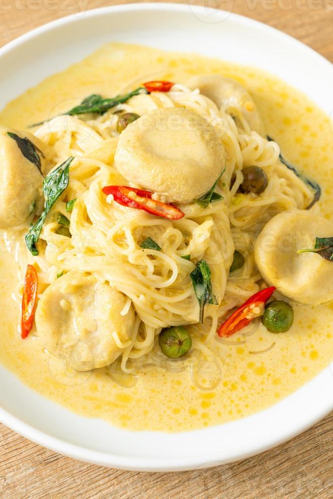 Rice Noodles with Green curry and Fish ball photo