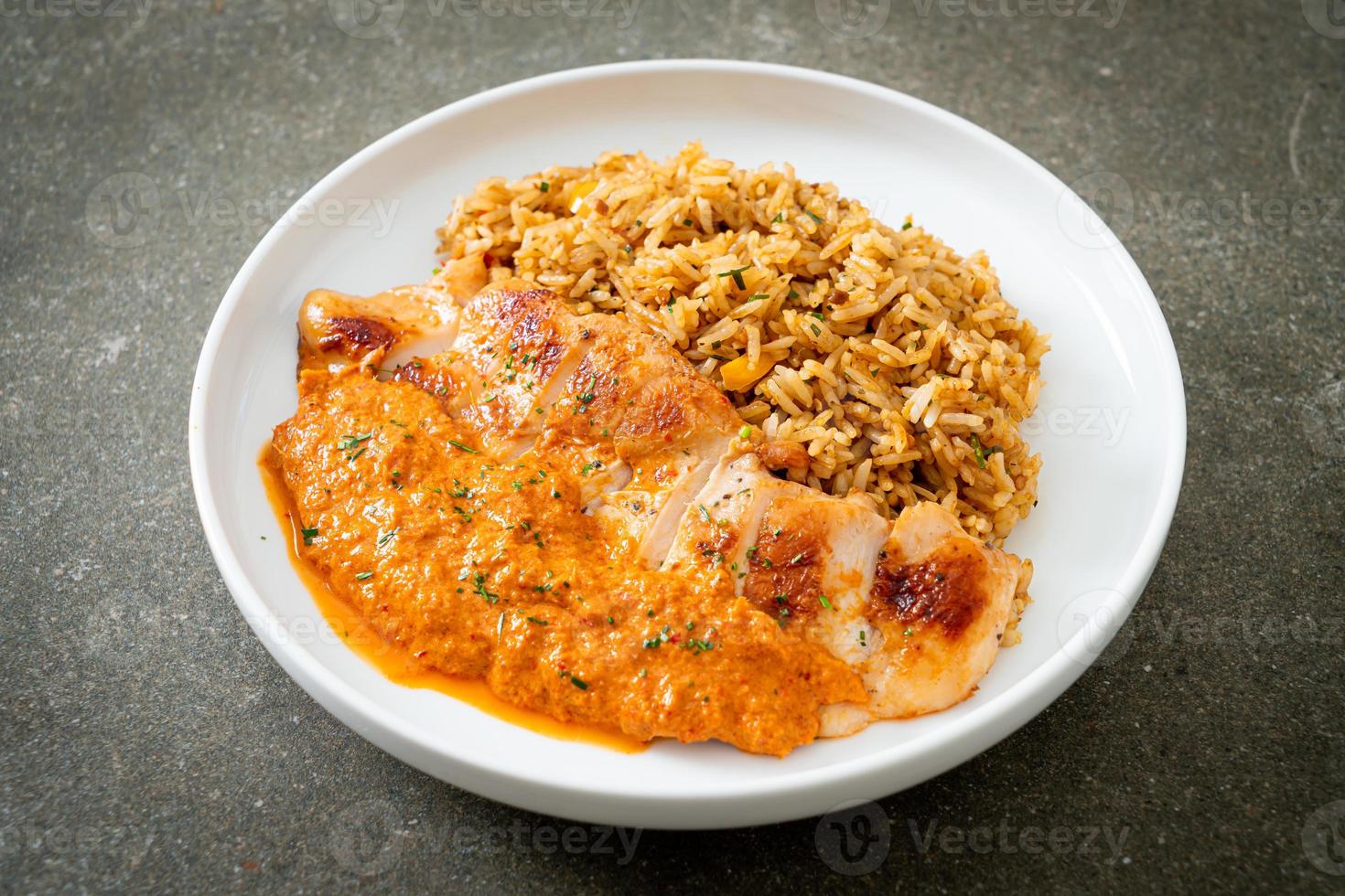 grilled chicken steak with red curry sauce and rice photo