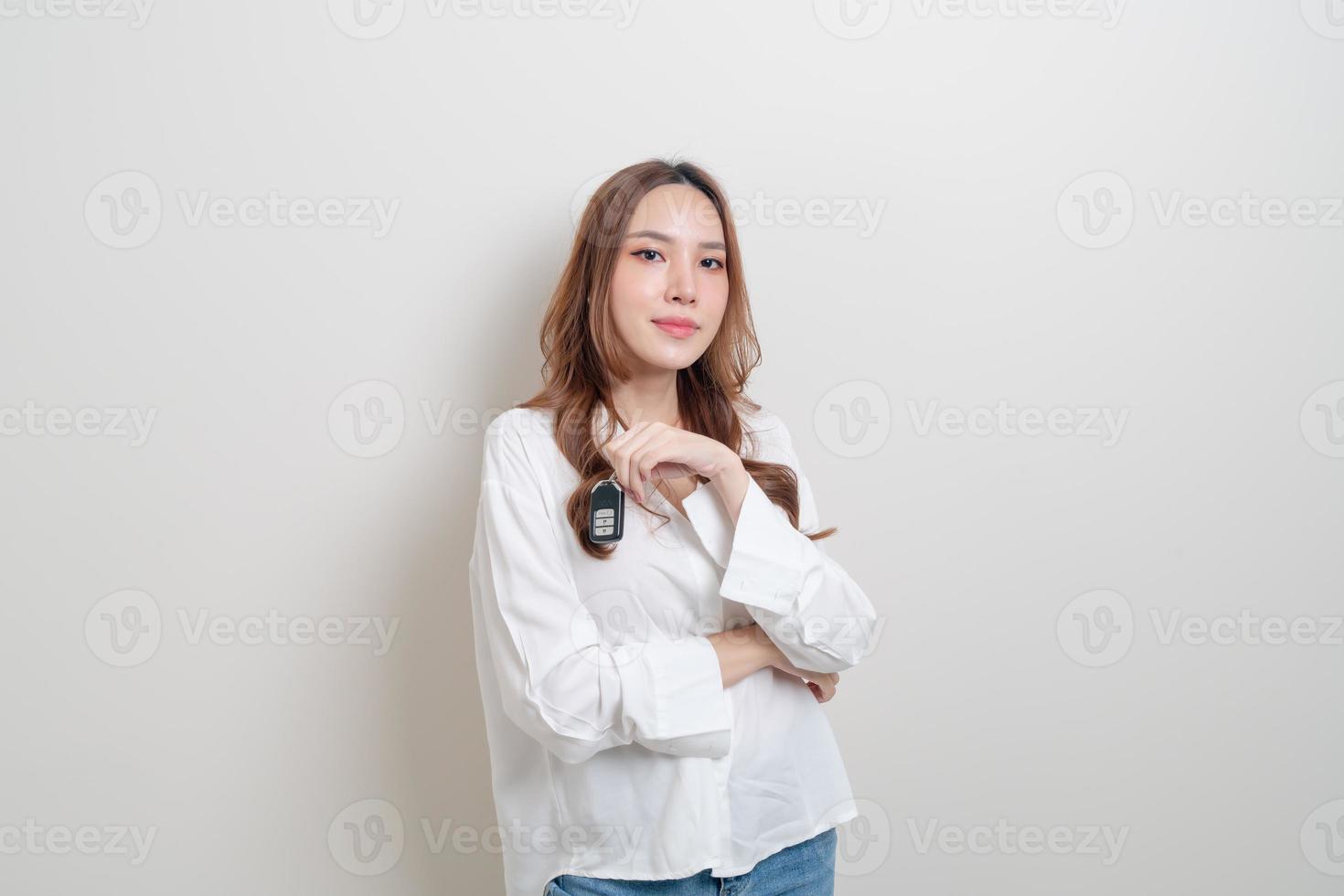 portrait beautiful woman holding car key photo