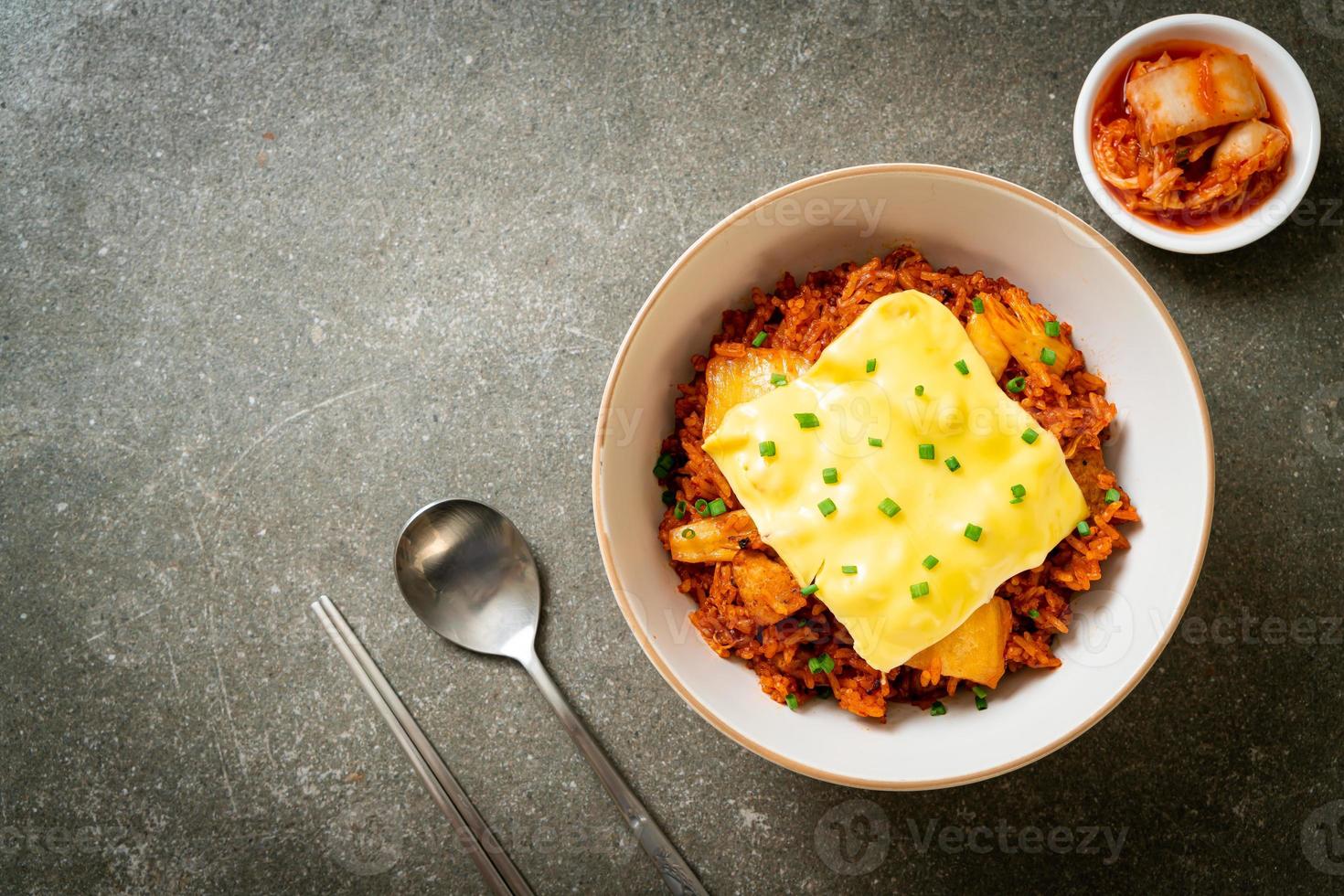 kimchi fried rice with pork and topped cheese photo