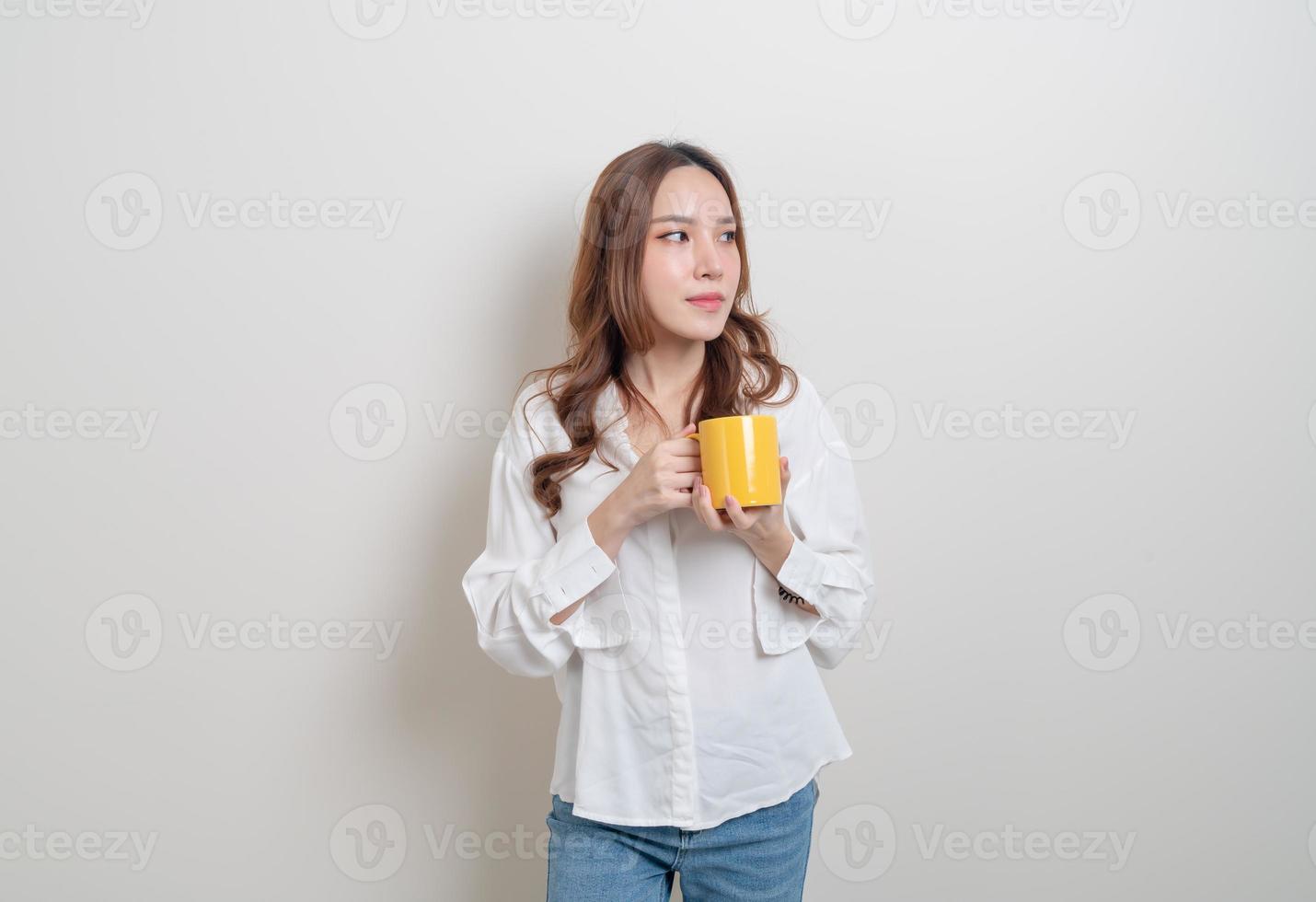 portrait beautiful Asian woman holding coffee cup or mug photo
