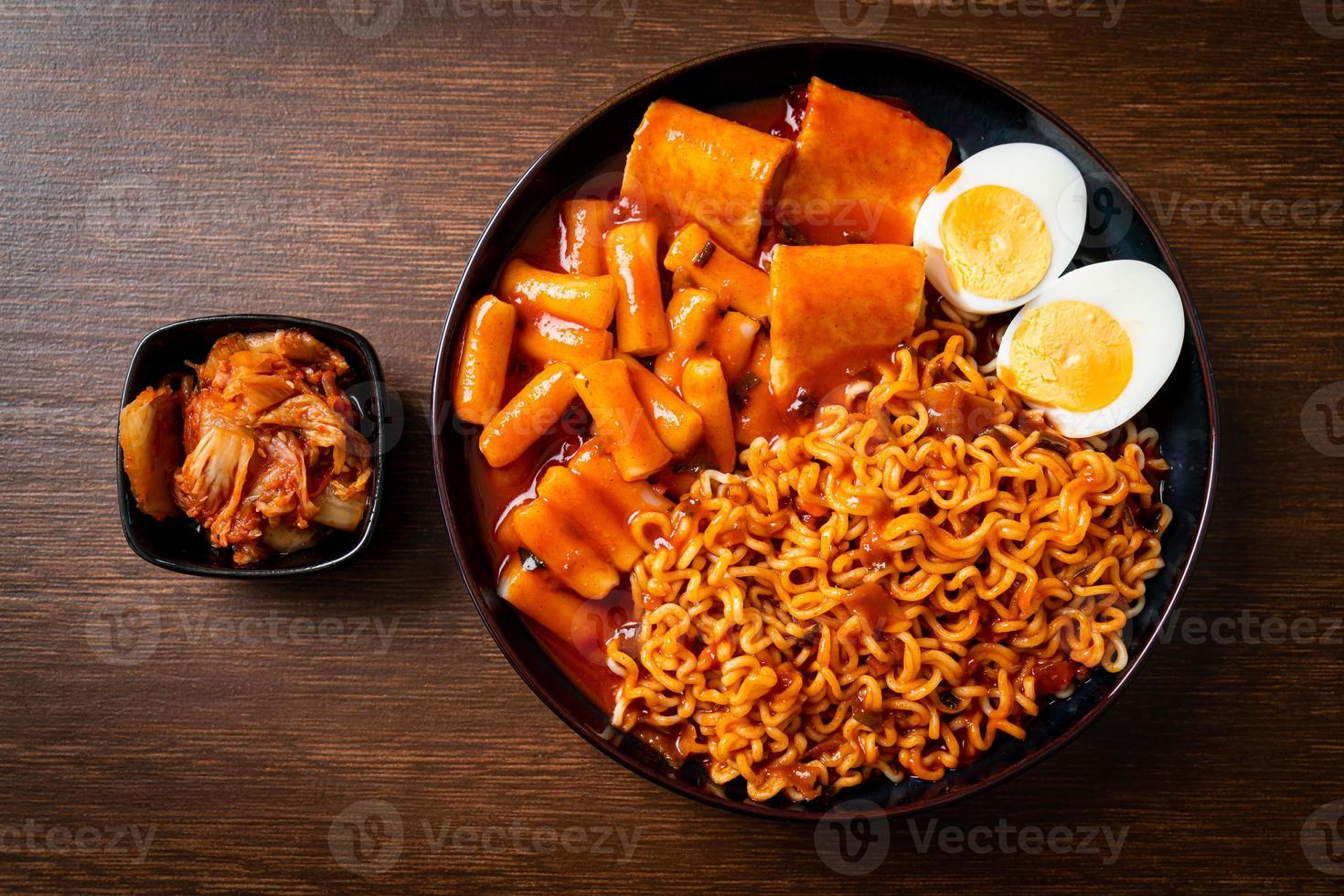 Korean instant noodles with Korean rice cake and fish cake and boiled egg photo